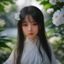 花友绿手指小白的头像，年轻女性，背景是绿色植物